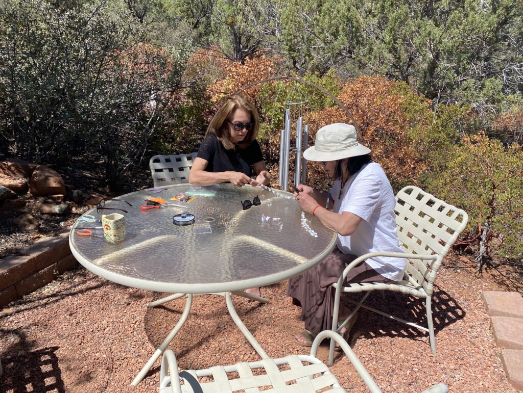 Two women working on crafts in Sedona, Arizona.